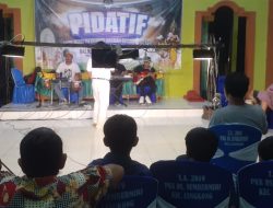 Warga Nobar Film Janur Kuning di Lokasi TMMD 124 Kodim Nganjuk.